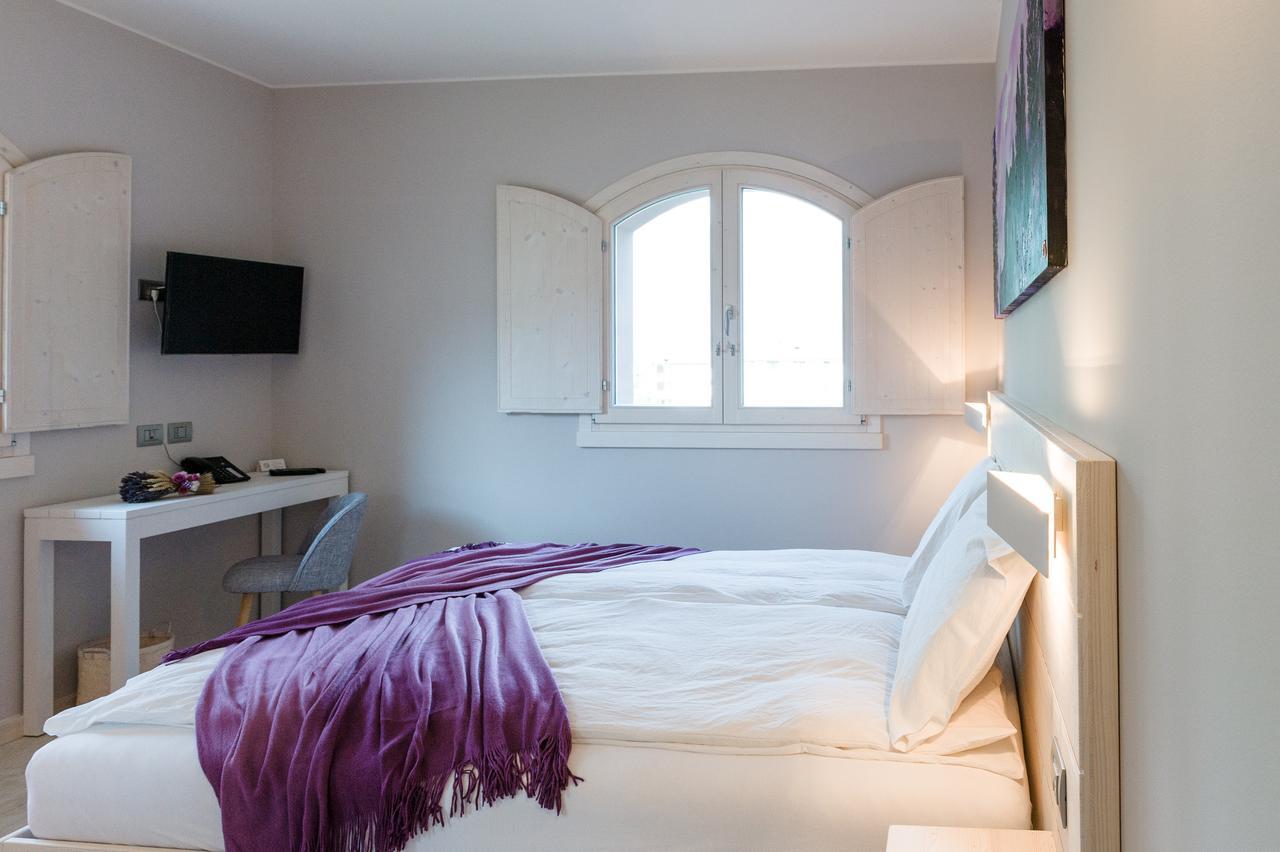 Bianco Hotel Primaluna Chambre photo